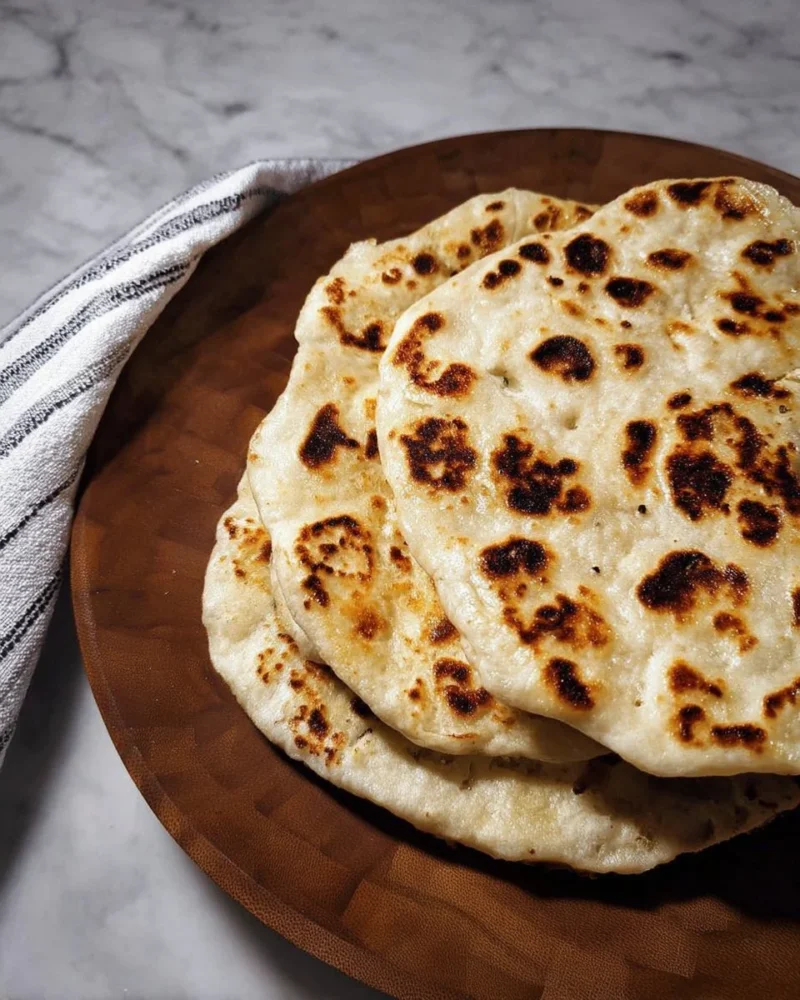 Homemade pita bread without yeast cooked in a pan